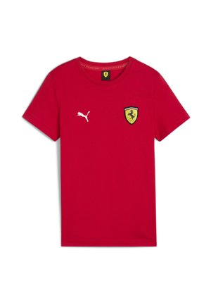 Camiseta roja de manga corta con el logo blanco de Puma en el pecho izquierdo y el escudo amarillo de Ferrari en el pecho derecho.