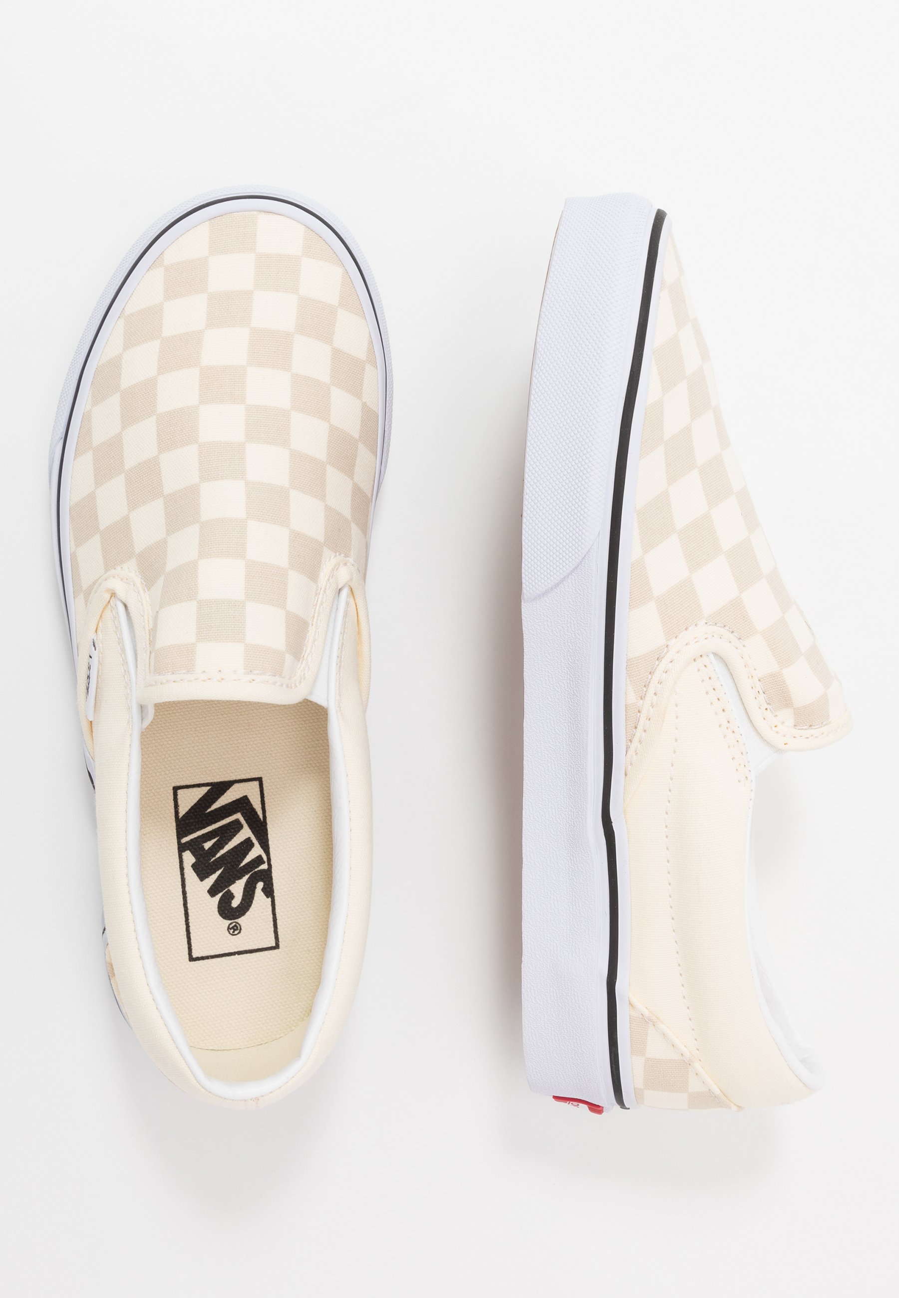 vans slip ons off white