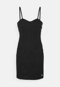 Black dress with thin straps, fitted design, seam detailing, and side stripes. Features a small Adidas logo at the hem. Smooth texture.