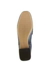 Blue leather shoe with a smooth upper, a flat black heel, and a light tan sole. Features embossed branding on the sole.