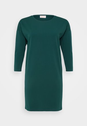 Dark green, knee-length dress made of soft fabric. Features a round neckline and three-quarter sleeves with a loose fit and no visible patterns.