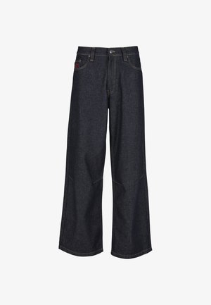 Sötétkék, széles szárú farmernadrág, klasszikus öt zsebes kialakítással, kontrasztos varrással és gombos sliccel.