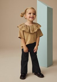 Next Tamprės – kelnės - black