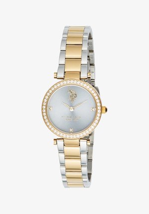 Orologio da polso rotondo in oro e argento con ghiera arricchita da cristalli, quadrante grigio chiaro, indicatori orari minimi e logo e testo U.S. Polo Assn.