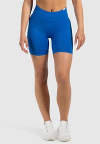 Blauwe high-waisted compressie shorts met een gladde, rekbare textuur. Heeft een brede tailleband en een slim fit ontwerp, ideaal voor sportkleding.
