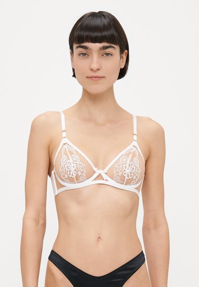 Bílá krajková podprsenka s květinovou výšivkou, trojúhelníkovými košíčky, nastavitelnými ramínky a saténovou mašlí uprostřed.
