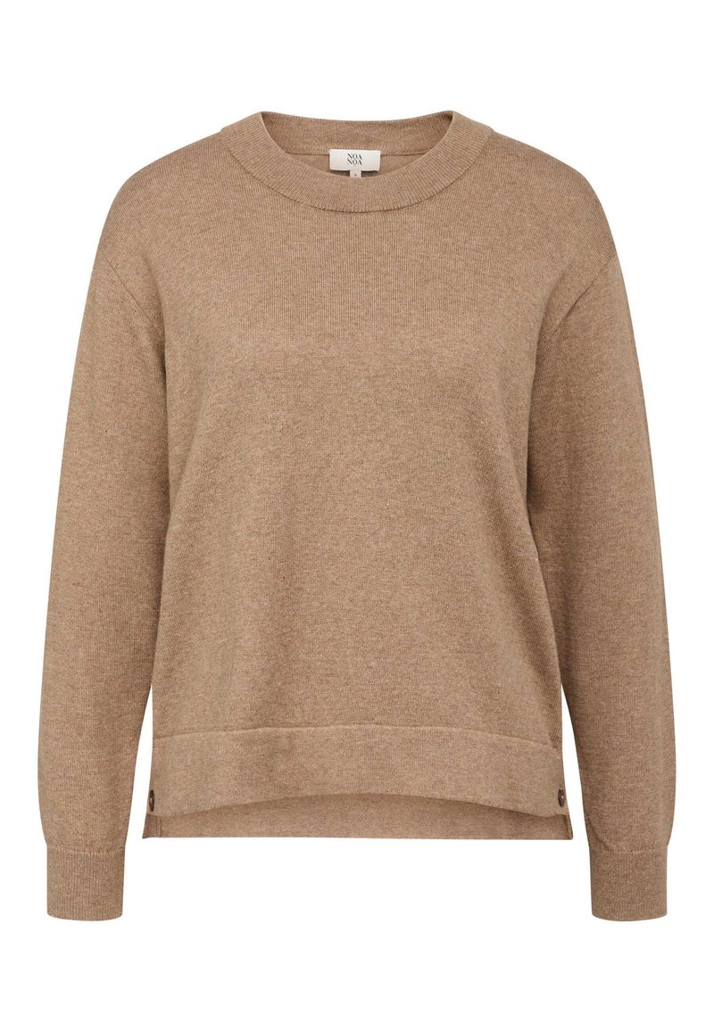 Ljusbrun sweatshirt i mjukt tyg med rund halsringning, långa ärmar och en något rundad nederkant. Har knappar på sidorna som detalj.