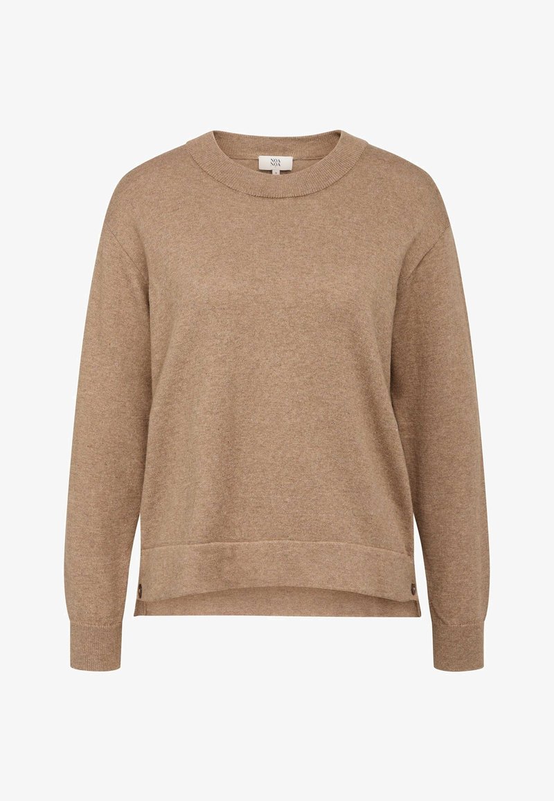 Ljusbrun sweatshirt i mjukt tyg med rund halsringning, långa ärmar och en något rundad nederkant. Har knappar på sidorna som detalj.