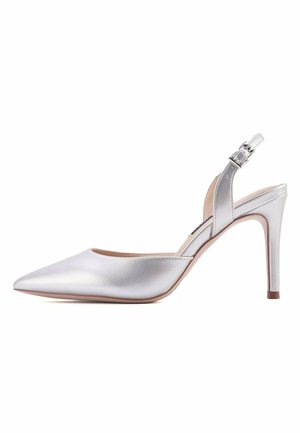 Silver synthetic slingback pump with a pointed toe and high stiletto heel. Smooth texture and adjustable strap with a metallic buckle.