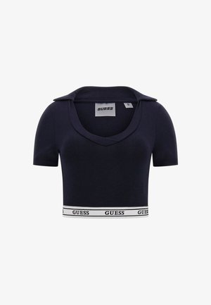 Námořnické zkrácené tričko vyrobené z měkké tkaniny. Má výstřih do V, krátké rukávy a bílý pruh na lemu s logem "GUESS".