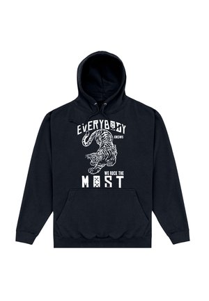 Schwarzer Hoodie mit weißem Tiger-Grafik und dem Text „Everybody knows we rock the most“ auf der Vorderseite, mit Fronttasche und Kordelzügen.