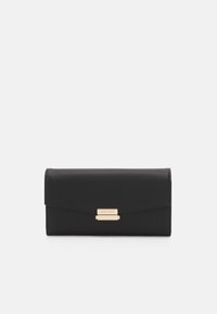 Black wallet made of textured material, featuring a gold-tone clasp and a minimalist design with a flap closure. Elegant and compact form.