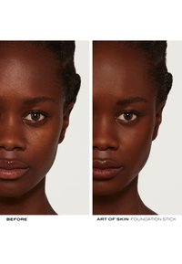 Side-by-side comparison of a face before and after applying Art of Skin foundation stick. Rich brown skin tone, smooth texture, even complexion.