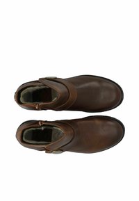 Bruna läderstövlar ankel med en slät yta, rund tå, sidodragkedja och dekorativ knappdetalj. Fodrade med mjukt material för värme.