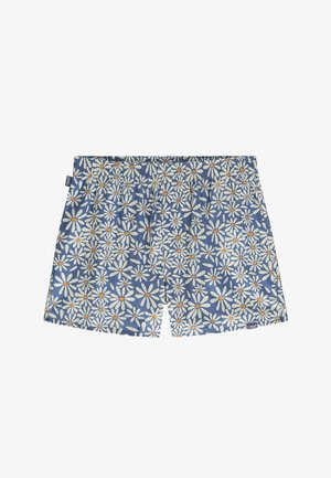 Pantaloni scurți de baie pentru bărbați dintr-un material albastru cu un model floral de margarete. Au talie elastică și centrele florilor în contrast de culoare portocalie.