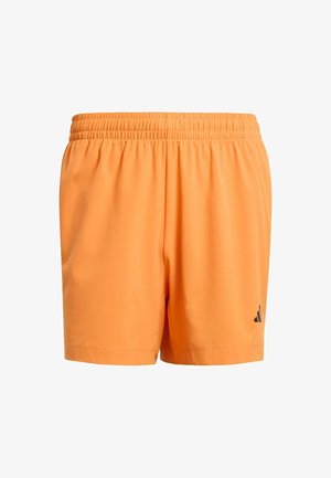 Orange athletic shorts with an elastic waistband and black logo detail on the lower left side. Smooth fabric texture, mid-thigh length.