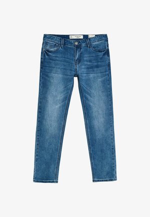 Niebieskie jeansy z denimu z przednimi kieszeniami, szlufkami na pasek i zapięciem na guziki, prezentujące subtelne wyblakłe detale na udach i kolanach.