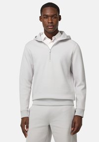 Lichtgrijze pullover sweatshirt met een capuchon en een kwart-ritssluiting. Voorzien van geribde manchetten en een zoom, gemaakt van zachte, gestructureerde stof.