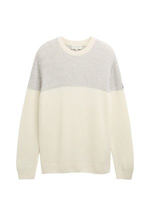 Crème en lichtgrijs geribd gebreid sweater met een ronde halslijn en lange mouwen. Heeft een kleurblokontwerp en een zachte textuur.