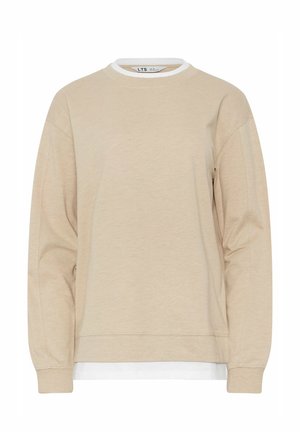 Sudadera beige de manga larga con cuello redondo, superpuesta sobre una camisa blanca, mostrada sobre un fondo blanco liso.