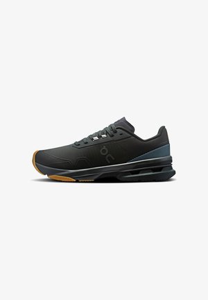 Black athletic shoe with grey accents, textured upper, laces, and flexible sole. Features rubber outsole for traction and support.