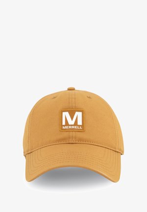 Tan cotton cap with curved brim. Features a white "M" logo in a square patch on the front. Stitching detail visible on the brim.