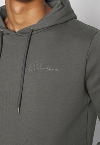 CLOSURE London Luvtröja - dark grey