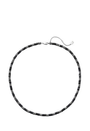 Schwarz-silberne Perlenkette mit einem Metallverschluss und einer verstellbaren Kette, die in einem kleinen blumenförmigen Anhänger endet.