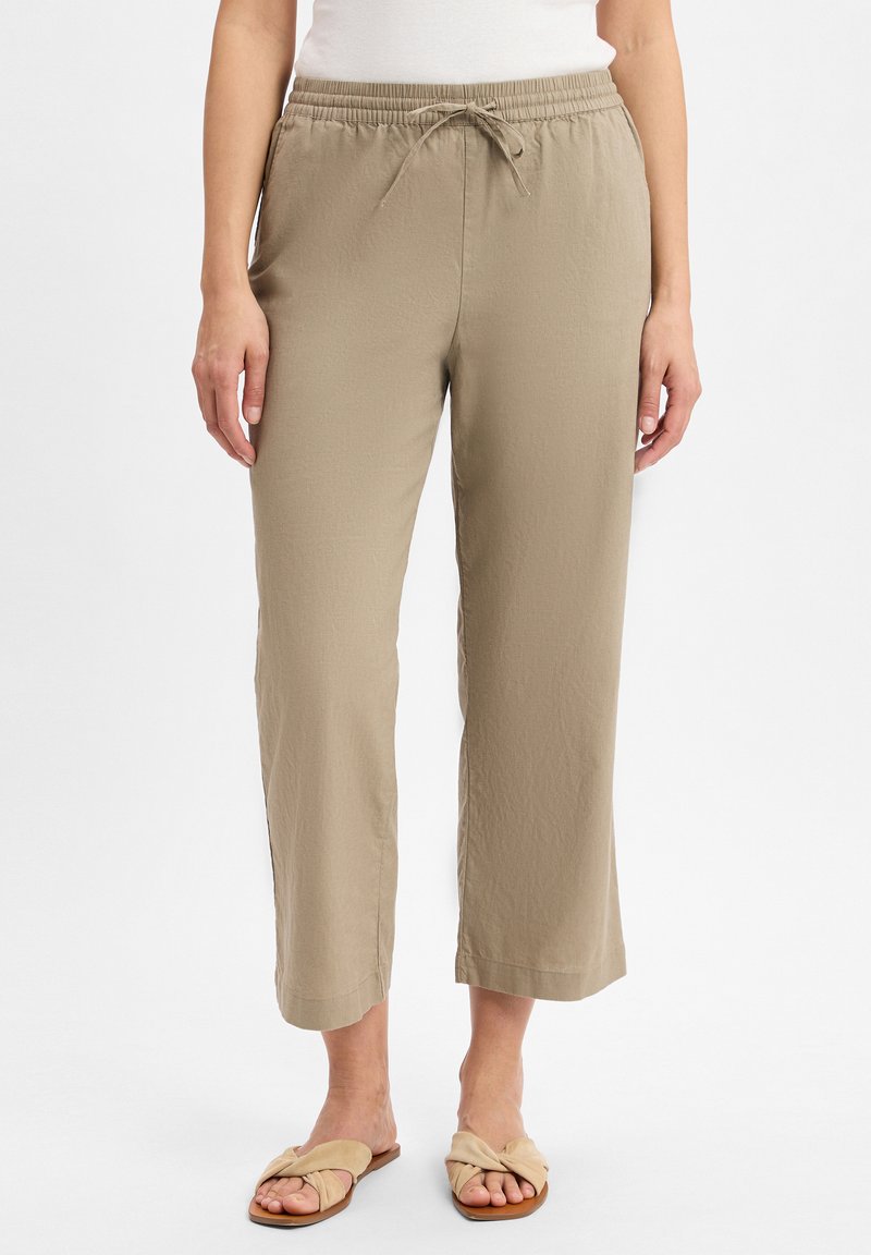 Beige korte broek van lichtgewicht stof, met een elastische tailleband met een trekkoord en zijsplitsingen aan de zoom.