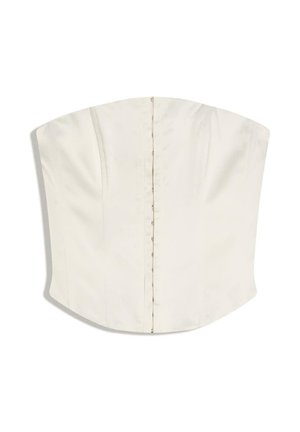 Top alb fără bretele în stil corset, cu închideri cu cârlige și ochiuri în față și detalii subtile de cusături verticale.