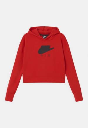 Rød cropped Nike Air hættetrøje med lange ærmer og sort Nike swoosh-logo på brystet mod en ensfarvet baggrund.