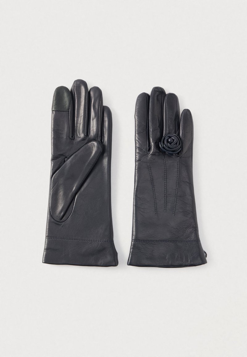 Δερμάτινα γάντια σε μαύρο χρώμα, με ένα floral σχέδιο σε ένα από τα γάντια, υφασμένο ύφασμα με υφή και λείο φινίρισμα. Ακροδάχτυλο συμβατό με οθόνες αφής.