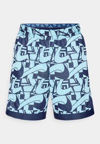 Blue and navy swim shorts with a graphic print featuring abstract shapes and patterns. Elastic waistband with a smooth texture and logo detail.