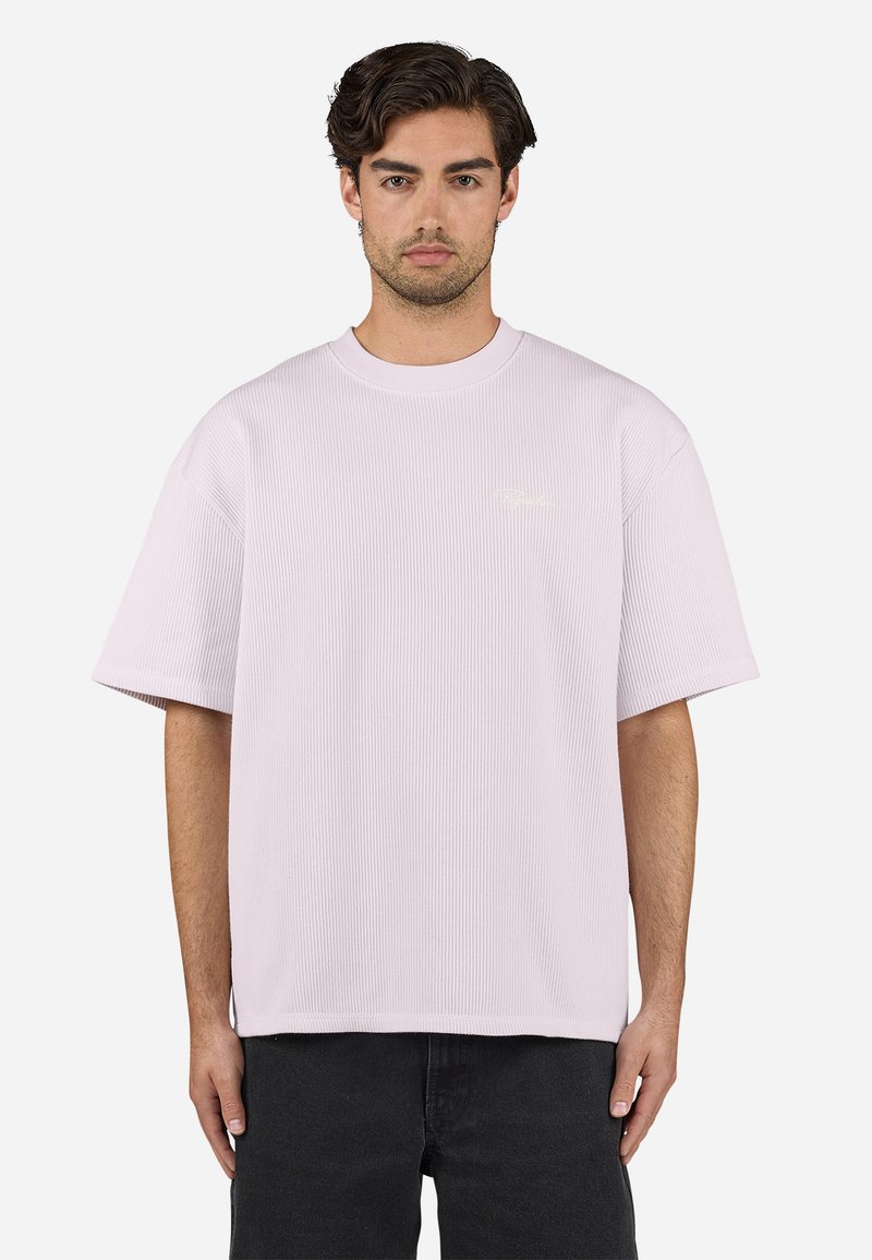 Light pink ribbed t-shirt with a crew neckline, short sleeves, and a subtle logo detail. Made of cotton for a textured look.
