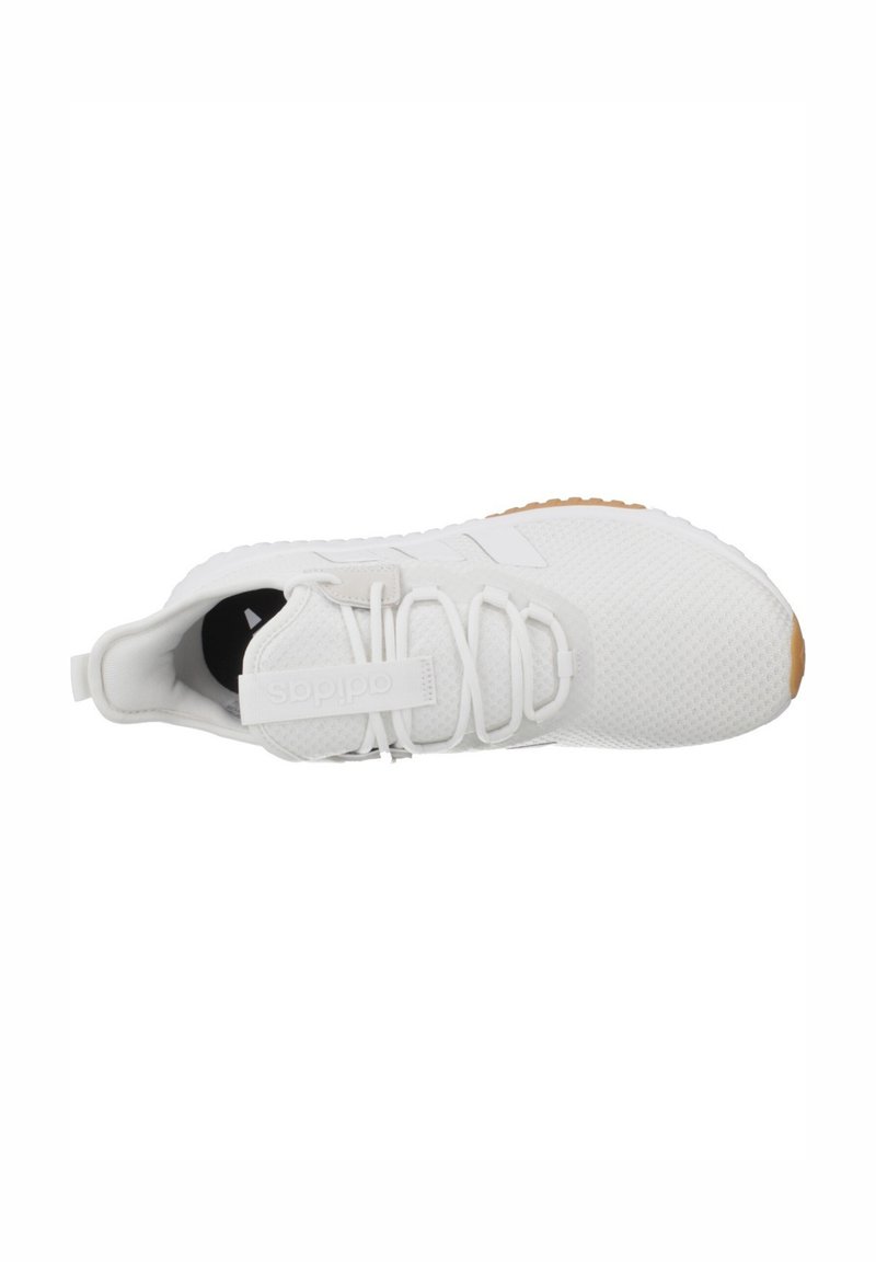 White Adidas sneaker with mesh upper, lace-up closure, and tan rubber outsole, shown from above on a white background.