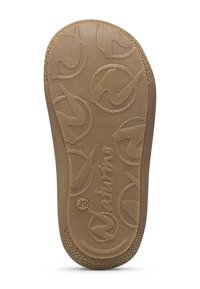 Podešev s texturovaným, béžovým gumovým povrchem, který má vzor kruhového loga a hladký vnější okraj, označený "20" pro velikost.