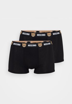 Boxers en coton noir avec une ceinture élastique imprimée d'ours portant le logo "Moschino". Texture douce, design ajusté et forme classique.