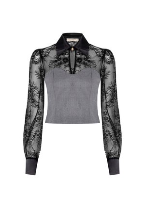 Grauer Crop-Top mit durchsichtigen schwarzen Spitzen-Ärmeln, schwarzem Kragen und goldener Knopfakzent am Hals. Strukturiertes Oberteil-Design.