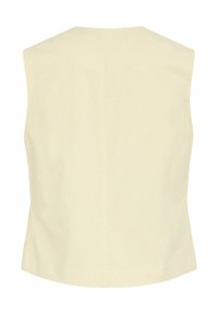 Krém színű ujjatlan mellény enyhén szabott fazonnal és sima hátrésszel, fehér háttér előtt bemutatva.