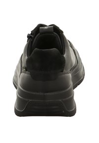 Schwarze Sportschuhe mit einer glatten Lederaußenseite, gepolstertem Schaft und strukturiertem Gummisohle. Verfügt über einen Reißverschluss auf der Rückseite.