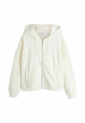 Fehér cipzáras kapucnis pulóver húzózsinórokkal és oldalzsebekkel, egyszerű fehér háttéren bemutatva.