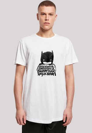 White cotton t-shirt featuring a black graphic of a masked figure and text, with short sleeves and a crew neck design.