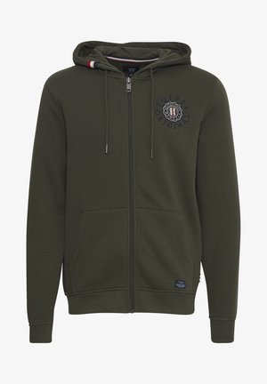 Olive spalvos zip-up hoody pagamintas iš minkštos medžiagos. Pasižymi priekinio logotipo, dviem šoninėmis kišenėmis bei gumbuotais rankogaliais ir apačia.