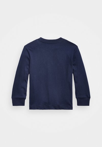 Μακριά μπλούζα μάρκας Navy από βαμβάκι. Διαθέτει στρογγυλή λαιμόκοψη και εφαρμοστά μανίκια. Λείο υλικό χωρίς επιπλέον μοτίβα ή σχέδια.