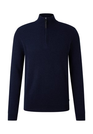 Marineblauwe geribbelde gebreide trui met lange mouwen en een korte ritssluiting aan de voorkant van de opstaande kraag.