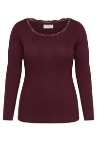Bordeaux lange mouwen top met ribbelstructuur en een decoratieve kantafwerking rond de ronde hals. Zachte stof, aansluitende pasvorm.