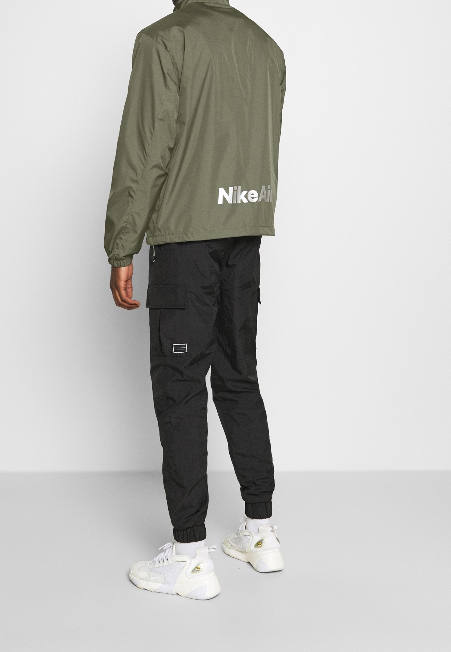 dark green nike windbreaker