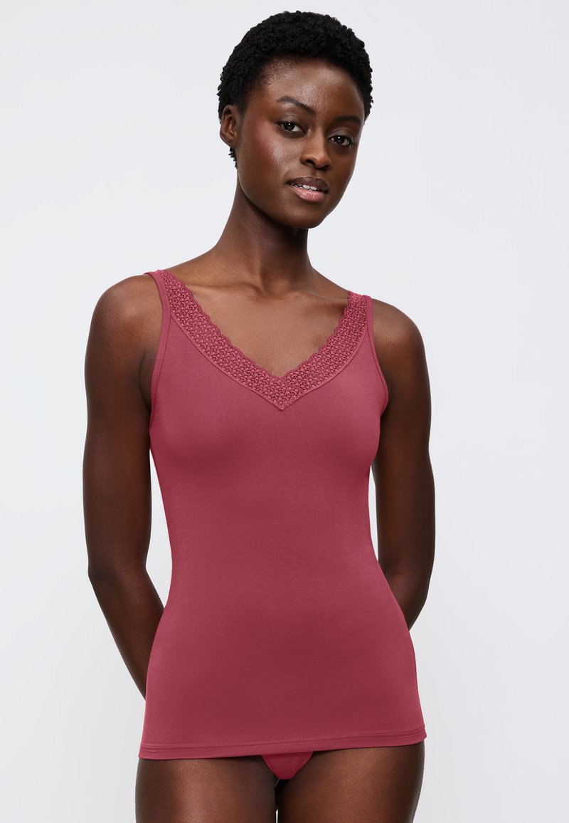 Raspberry tank top with lace trim along the V-neckline. Made from smooth fabric, it features a fitted design and thin straps.