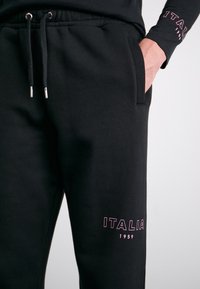 Ellesse USCERNO - Παντελόνι φόρμας - black