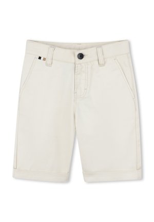 Light beige cotton shorts with a straight cut, rolled hems, and two front pockets. Features black button and small hardware accent.